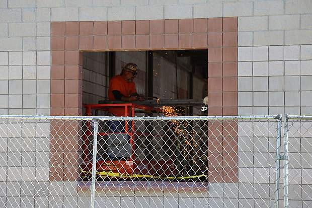 A welder is seen recently working on the expansion at Damonte Ranch High School, which will be ready for students for the beginning of the 2018-19 school year.