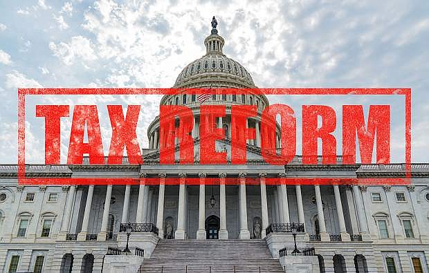 United States Capitol Building in Washington, DC with Tax Reform stamp effect