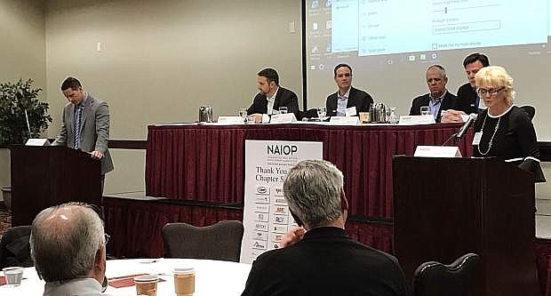 Joel Grace, Todd McKenzie, Par Tolles and Doug Roberts were among panelists at the NAIOP Northern Nevada Chapter HOWsing &amp; Developmenmt Forum on Feb. 22. At far left is Doug Flowers of Holland &amp; Hart and Denise Barcomb, (far right), who served as moderators.