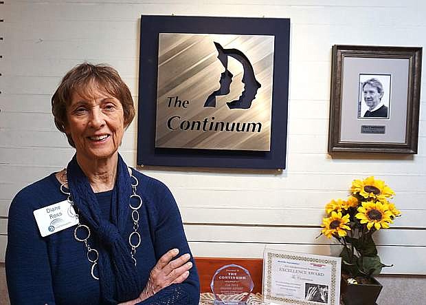 Diane Ross, CEO and president of The Continuum, credits the business&#039; growth in part to the dedication of her late husband, Jerry Cruitt (pictured in the frame), who died in 2016.