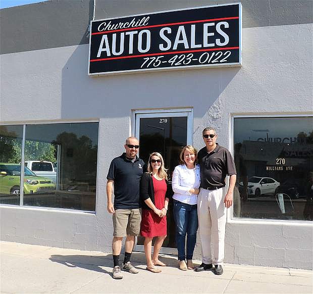 Churchill Auto Sales owners from left, Milt and Jessilyn Wallace, Paula and Ron Marrujo, join forces to open Fallon&#039;s new auto shop.