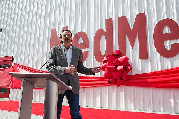 Cary Richardson, vice president and senior project manager at Miles Construction, speaks during the grand opening of the MedMen Mustang marijuana factory on April 11. Miles Construction was the lead contractor of the facility.