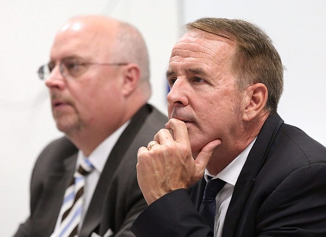 Chancellor Dr. Thom Reilly, right, listens to public comments on whether an acting or interim president of Western Nevada College in September 2017.