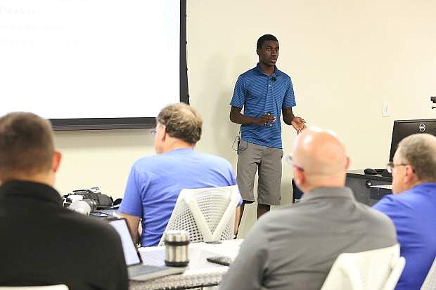 Sam Gbafa, CEO and founder of tech startup Lorable, a choose your own adventure platform, presents during a 1 Million Cups event on Wednesday, Aug. 8 at the UNR Innevation Center.