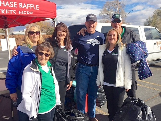 First Independent Bank is joining with community organizations to collect winter coats for Northern Nevada children. Pictured, from left, are volunteers from last year&#039;s coat drive: Karen Potts, Kathy Basso, Kandee Chaney, Mike Hix, Jeanine Reddicks and Tom Potts.