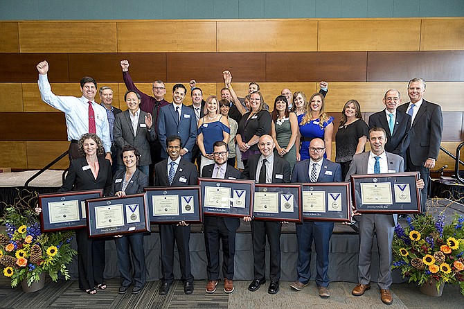 Students from the 2018 Online Executive MBA cohort celebrate their commencement this summer.