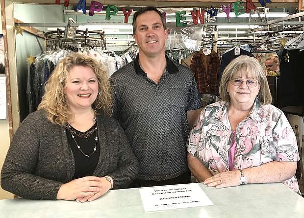 From left are Cherilee and Ryan Sorensen, the new owners of Crystal Cleaners, and Crystal Wickware, who owned the business for 23 years.