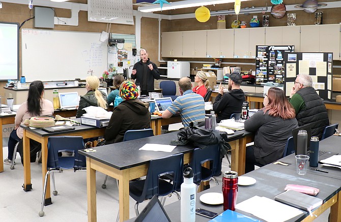 Washoe County School District middle school teachers participating in Project ReCharge listen to a presentation given by NV Energy&#039;s Justin Jones on Thursday, Jan. 10, at Billinghurst Middle School in Reno. 