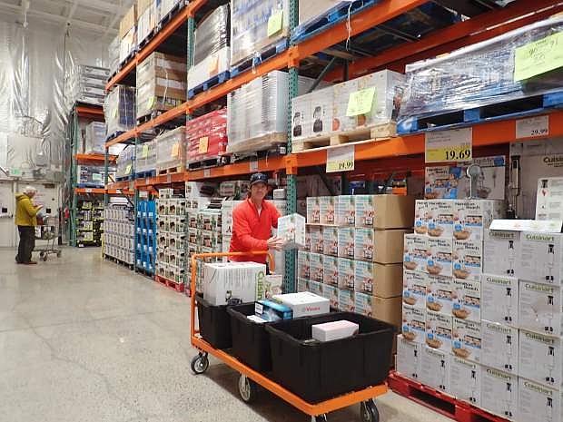 Thomas Leone, founder of Renoagogo, picks up supplies at a Costco in Reno. The new delivery service in North Lake Tahoe will allow residents to have groceries and supplies from any store in Reno delivered straight to their doorstep.