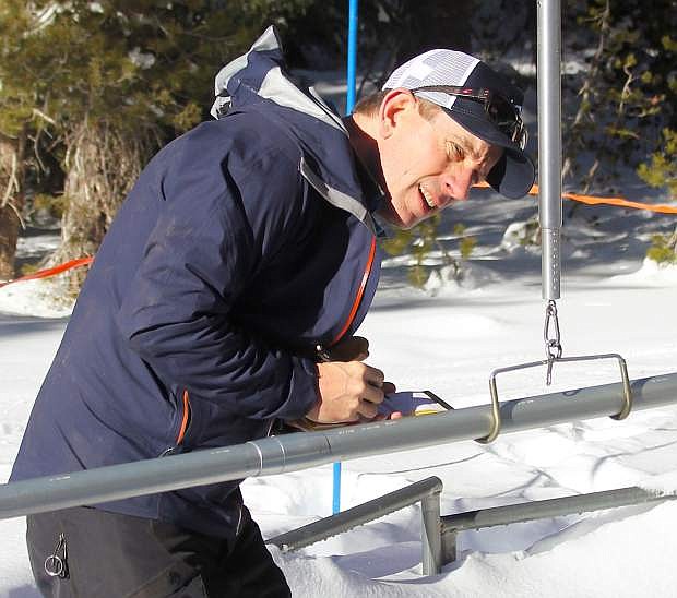 Natural Resources Conservation Service hydrologist Jeff Anderson measures the snowpack on Jan. 2 at Mt. Rose Ski Tahoe.