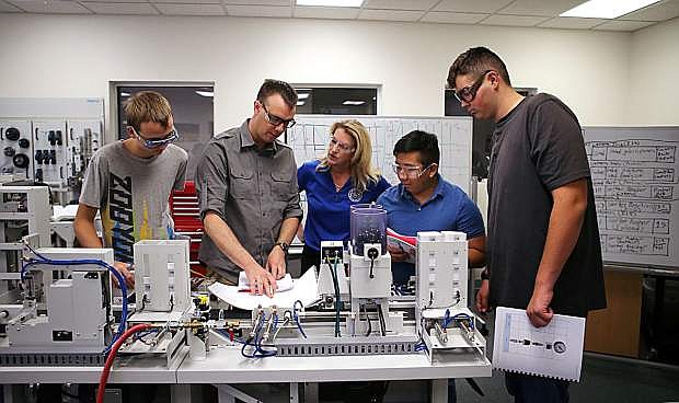 Mechatronics students work at Western Nevada College in Carson City, on Monday, Aug. 12, 2018.