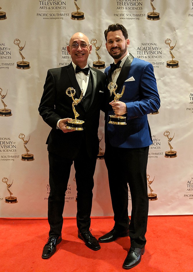 Eric Bonnici, Vice President of the Nevada Broadcasters Association (left), and Alphonse Polito, Producer and Director at Three Sticks Productions, smile with their Emmy awards on June 15 in Las Vegas.
