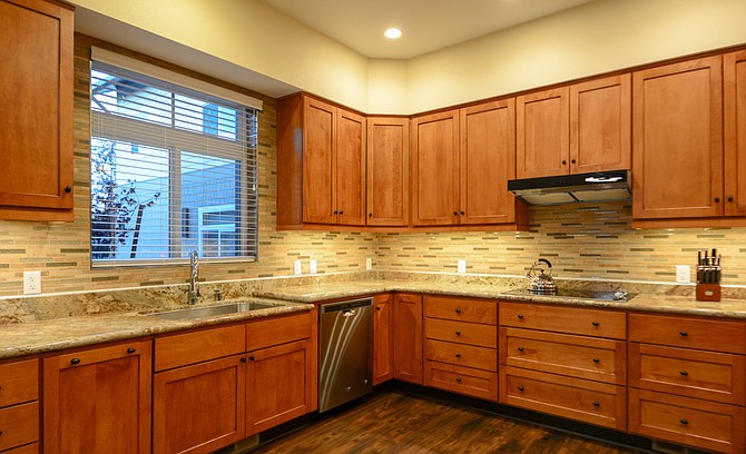Advanced Countertop Design performs residential and commercial installations across the region, like this kitchen remodel that&#039;s featured on the company website.