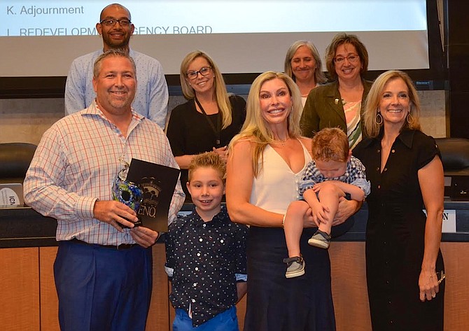 DoughBoys Donuts owners Jay Kenny, Jennifer Kenny and family were honored by city council at the July 31 meeting.