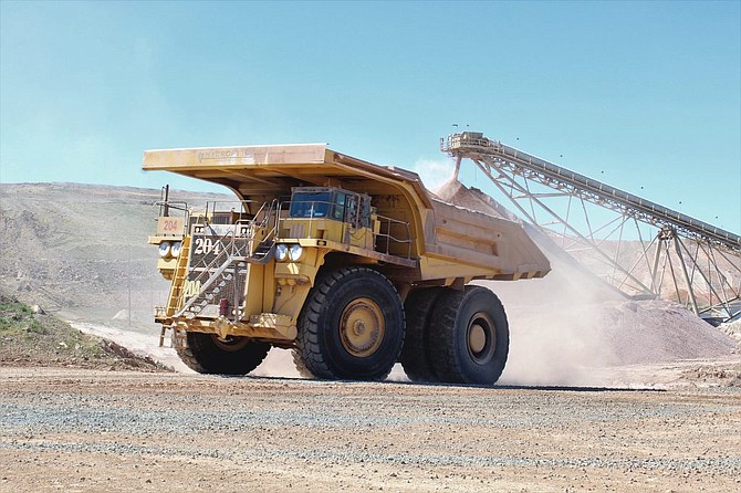 A Komatsu 530E haul truck exits the crusher pit after a Hitachi 5500 shovel fills the truck bed with crushed ore to be processed at the Hycroft Mine this summer.
