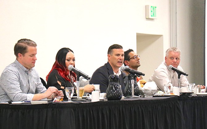 Ty Whitaker, center, co-founder and CEO of the Abbi Agency, talks about the importance of company culture during an NCET special event on Jan. 21 at the Reno-Sparks Convention Center. 