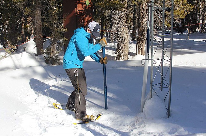Jeff Anderson measures the snowpack Monday, Jan. 6 at the Mt. Rose Ski Tahoe SNOTEL site.