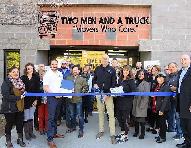 Members of The Reno + Sparks Chamber of Commerce held a ribbon cutting for Two Men And A Truck at their new location at 5440 Louie Lane, Suite 100, in Reno on Jan. 7.