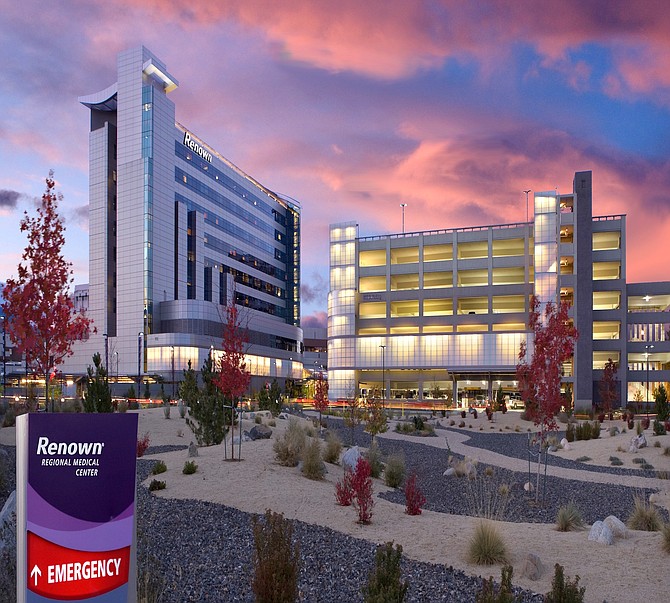 Area construction crews are working with Renown Health to create a temporary patient care area within the Mill Street parking structure at Renown Regional Medical Center.