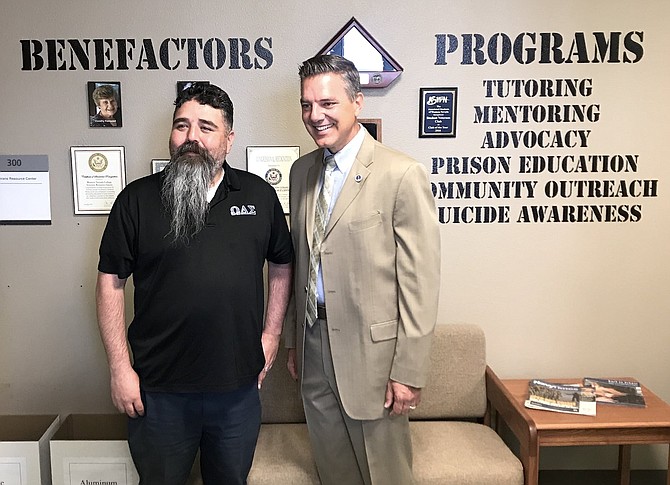 Wells Fargo Northern Nevada Region Bank President Yanus Nelson, right, with WNC Veterans Resource Center Coordinator Vincent Rivera during a 2019 tour of Western Nevada College.