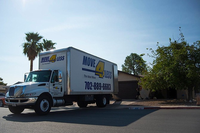 A moving truck as seen outside a home in Henderson on Sunday, Sept. 27, 2020.