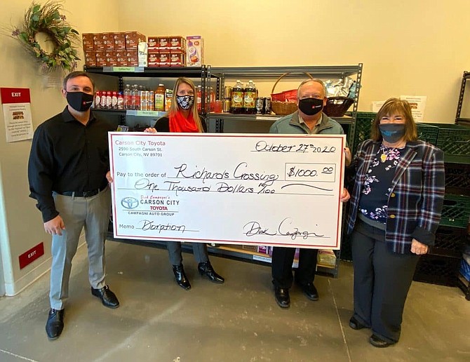 Carson City Toyota recently presented Richards Crossing, a Nevada Rural Housing Authority affordable housing property, a $1,000 donation to help provide residents household items.